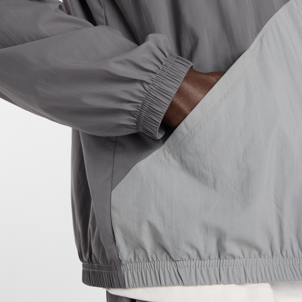 Pánska bunda New Balance MJ61J73YCAS – sivé