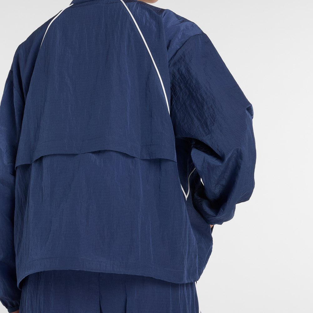 Dámska bunda New Balance WJ6113KSNNY – tmavomodrá