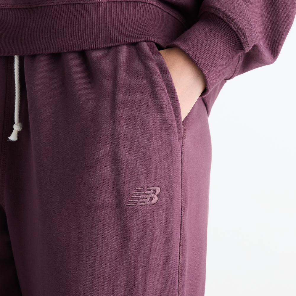 Dámske nohavice New Balance Athletics – fialové