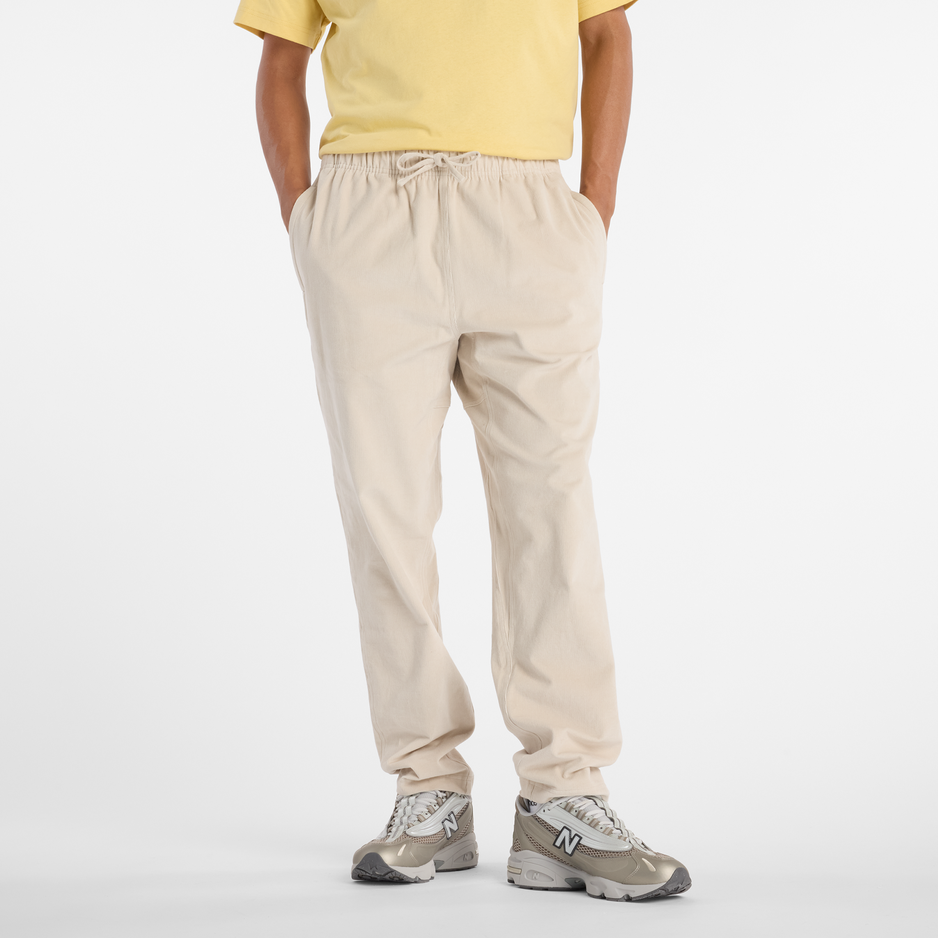 Pánske nohavice New Balance MP53521TWF – béžové
