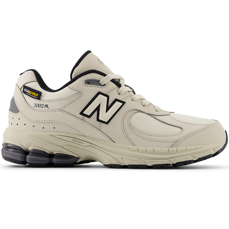 

Detské topánky New Balance GC2002PM – béžové