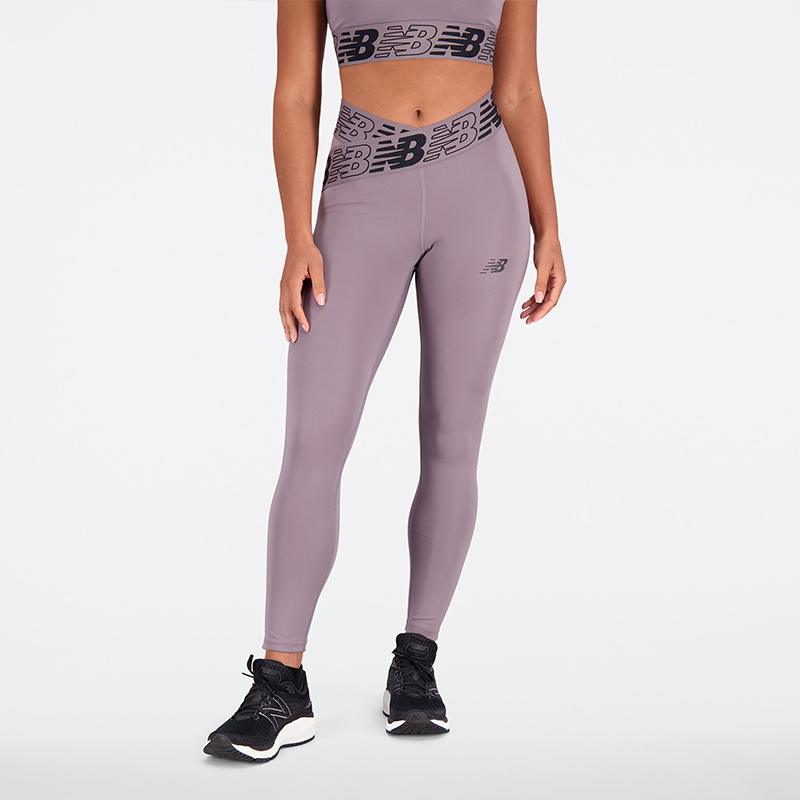 

Dámske legíny New Balance WP21177ZNC – fialové