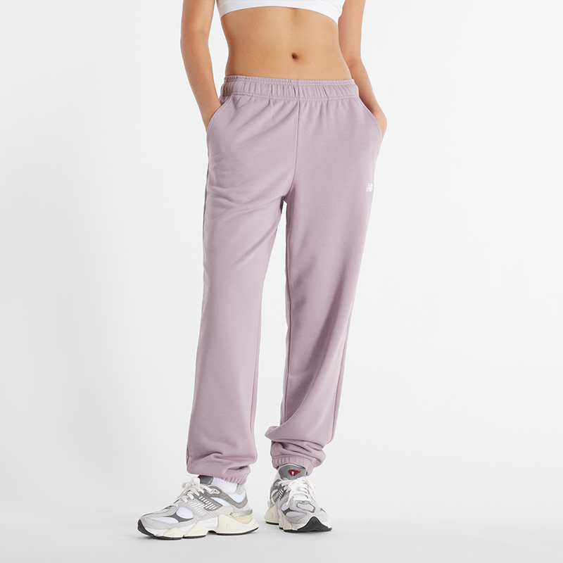 

Dámske nohavice New Balance WP41500ICW – ružové