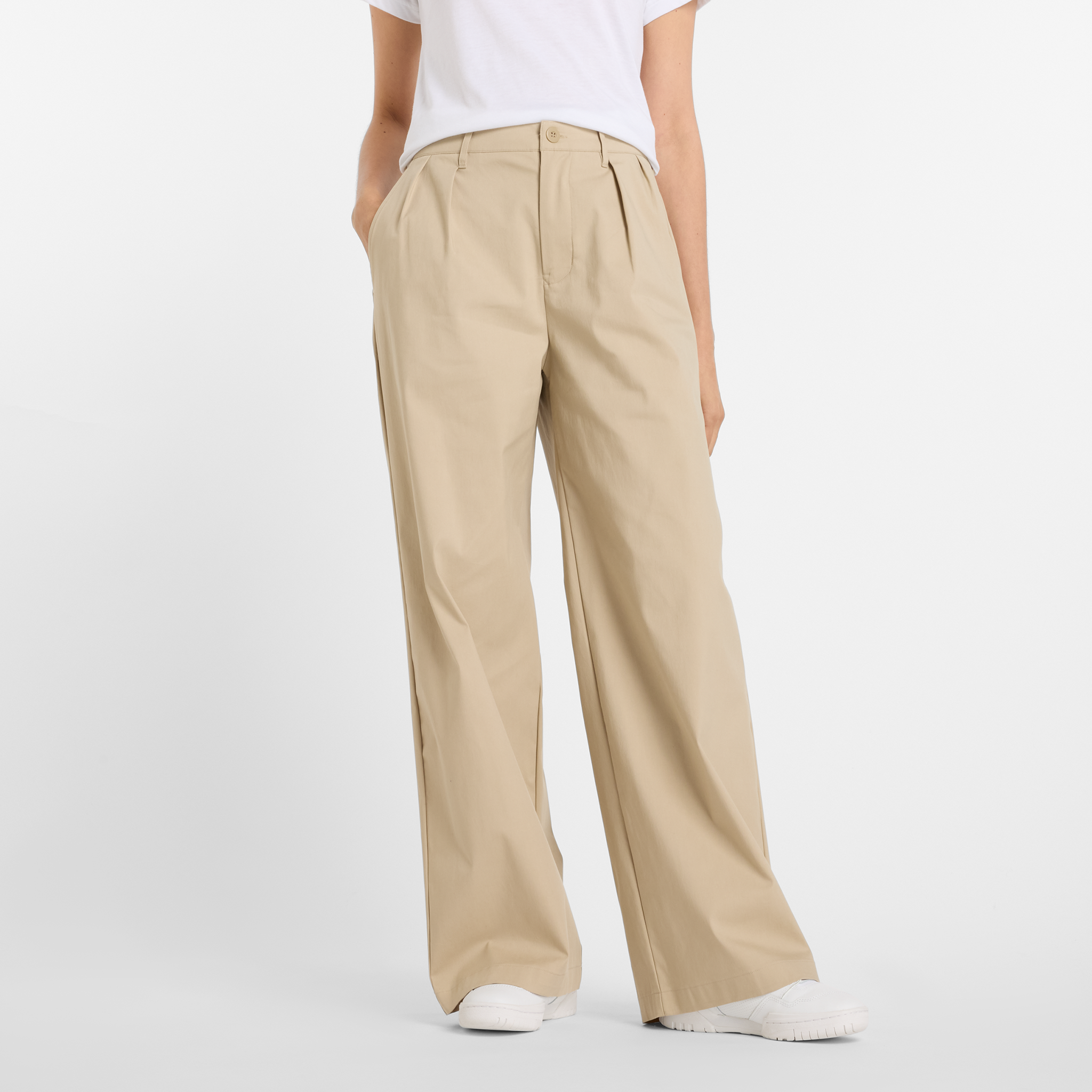 Dámske nohavice New Balance WP51538SOT – béžové