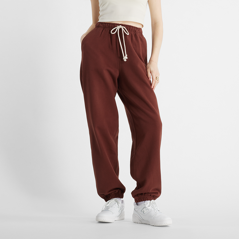 

Dámske nohavice New Balance WP41513ROK – hnedá