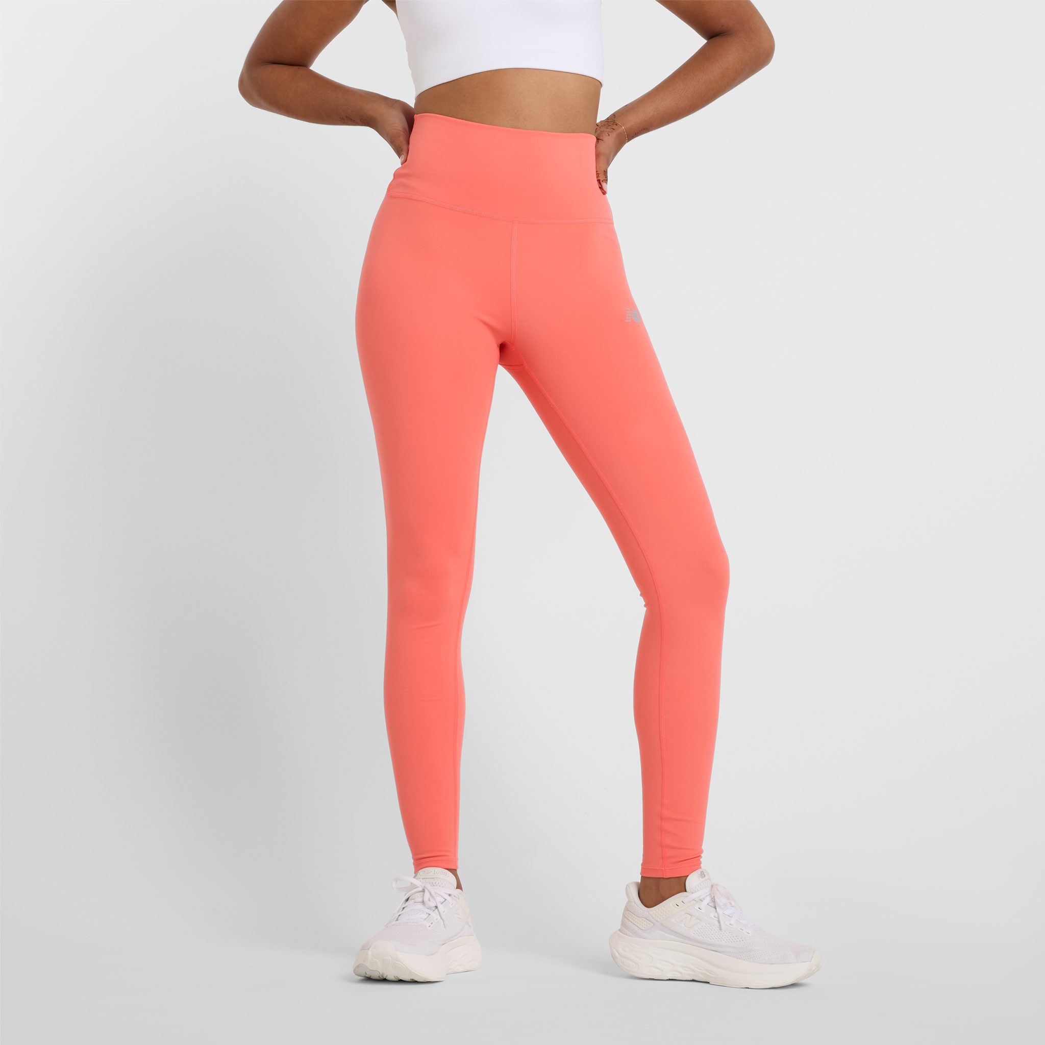 

Dámske legíny New Balance WP51126DTR – oranžová