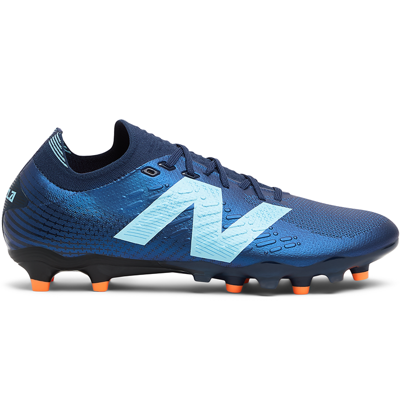 

Futbalové topánky New Balance TEKELA PRO FG V4+ ST1FLN45 – tmavomodrá