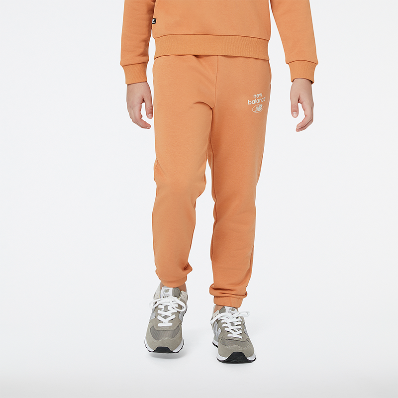 

Detské nohavice New Balance YP31508SEI – oranžová
