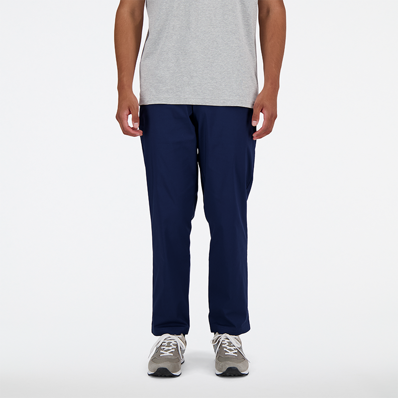 

Pánske nohavice New Balance MP41575NNY – tmavomodrá