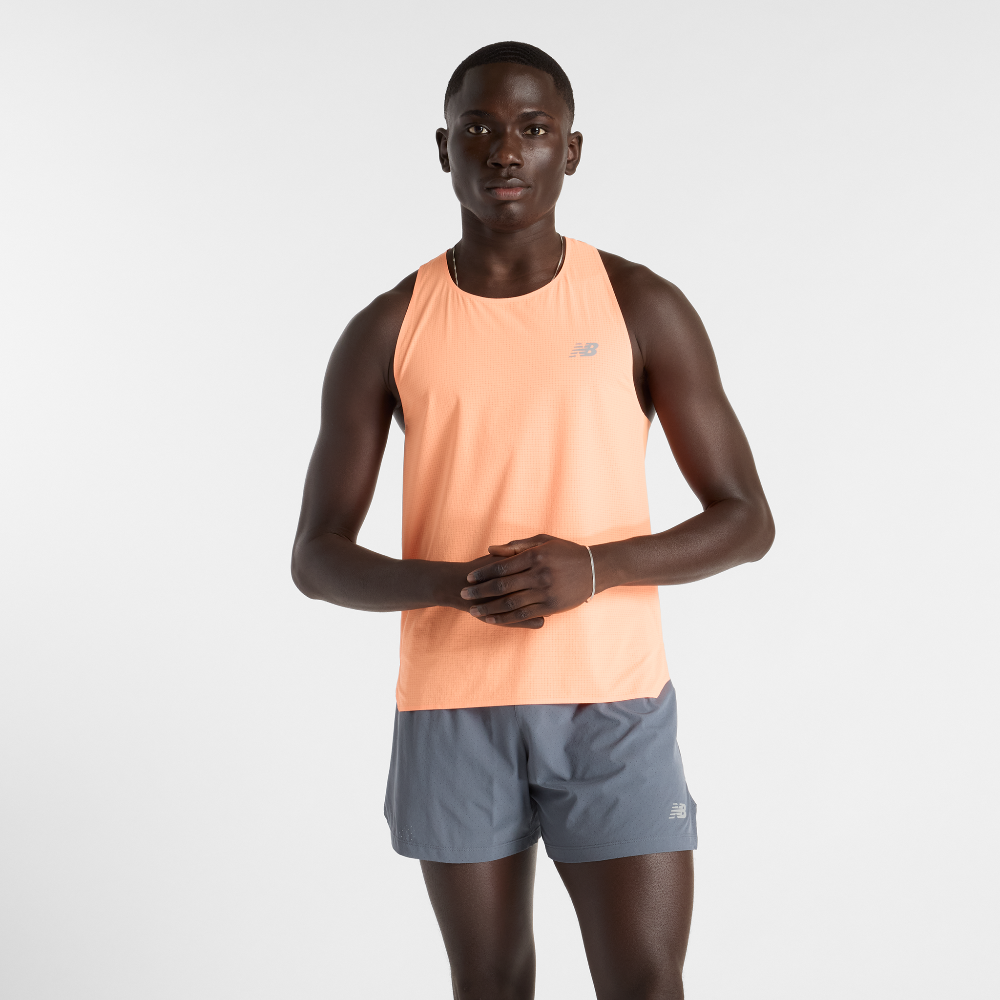 

Pánske tričko New Balance MT51205HMO – oranžová
