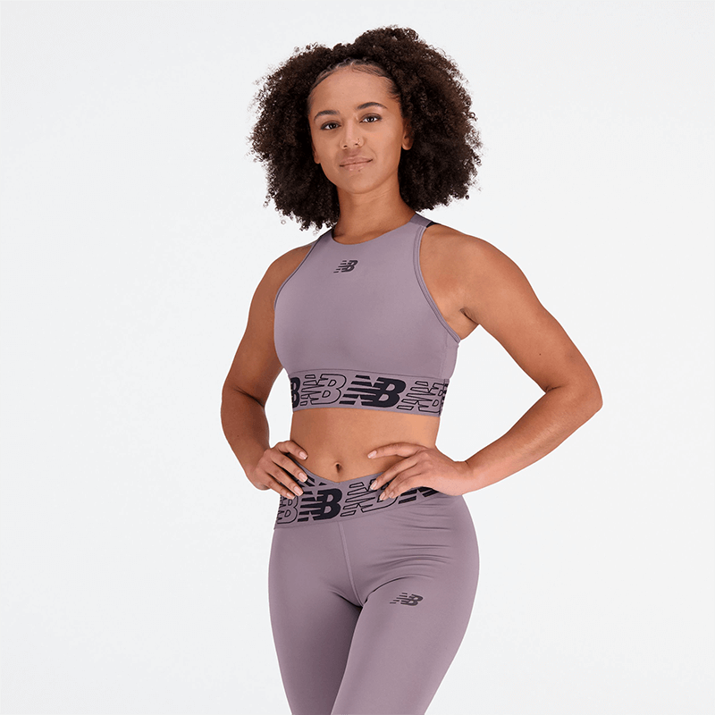 

Športový top New Balance WB31175ZNC – fialové