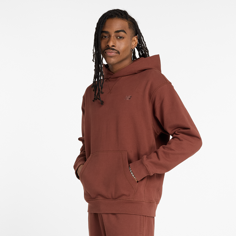 

Pánska bunda New Balance MT41534ROK – hnedá