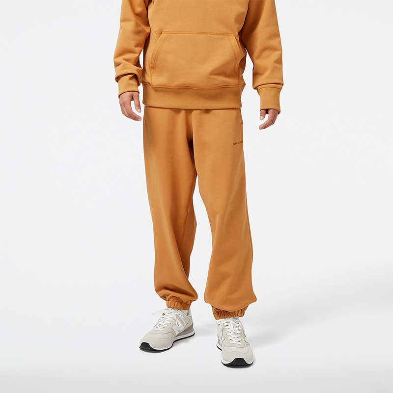 

Pánske nohavice New Balance MP23551TOB – oranžová